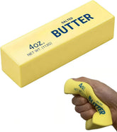 KidoKraze Butter Squishy in pastel yellow with realistic butter texture and soft, squeezable design for stress relief and sensory play.