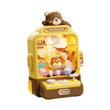 Kids Claw Machine toy by KidoKraze featuring a colorful mini arcade claw game with plush prizes inside.